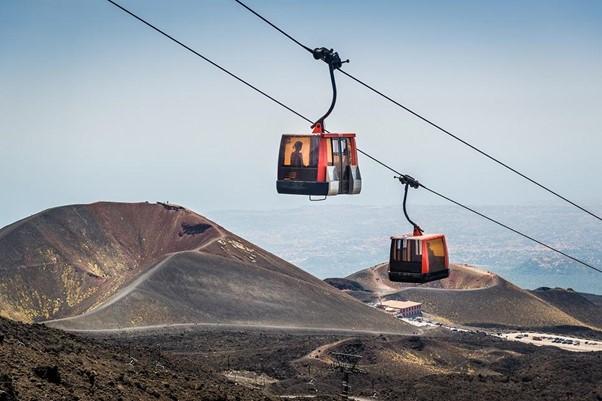 Mount Etna cableway. The inauguration took place in 1966. After several reconstructions due to the damages caused by different eruptions, today the departure base is at an altitude of 1900 m while the "summit" station is at an altitude of 2500 m. @sicilia-etna.it