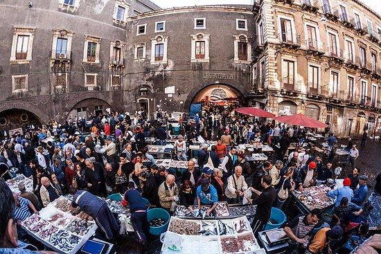 Open air fish market in Catania "A Piscarìa" or "La Pescheria". ®Sicily Car Service